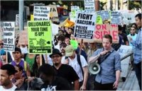 متظاهرون أمريكيون في وول ستريت رددوا بالعربية «الشعب يريد إسقاط النظام» 